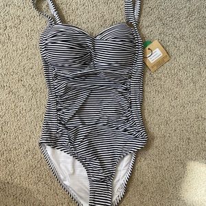 Never worn niptuck swim one piece!